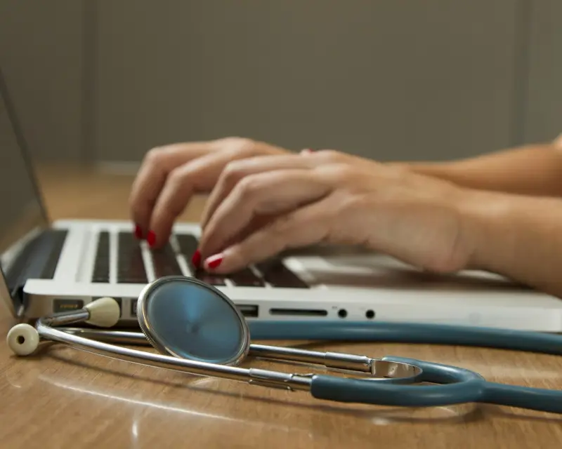 Surgical team collaborating around a patient
